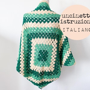 May include: A green and cream crochet shawl with a square pattern. The text "uncinetto istruzioni ITALIANO" is written on a pink circle in the top right corner of the image.