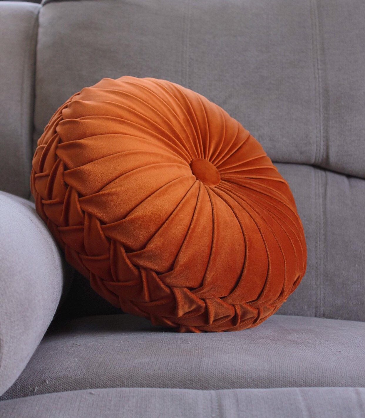 round tufted pillow