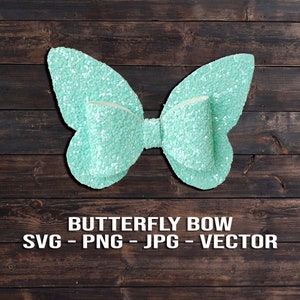 Pode incluir: Um laço de borboleta turquesa com glitter e um laço central. O laço está sobre um fundo de madeira marrom. SVG - PNG - JPG - VECTOR