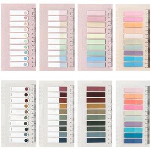 May include: Set of 4 sheets of colorful sticky notes with a ruler on the side. Each sheet has 14 different colored sticky notes with a white border.