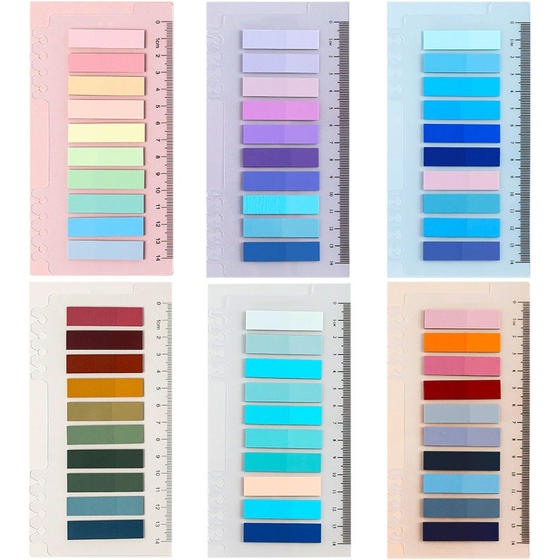 May include: Six sets of colorful sticky notes with a ruler on the side. Each set has 14 different colors of sticky notes.