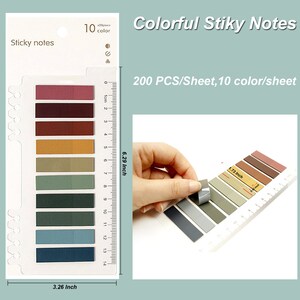 May include: A sheet of 200 colorful sticky notes in 10 different colors. The notes are 1.73 inches wide and 6.29 inches long. The sheet is labeled "Colorful Stiky Notes" and "200 PCS/Sheet, 10 color/sheet".