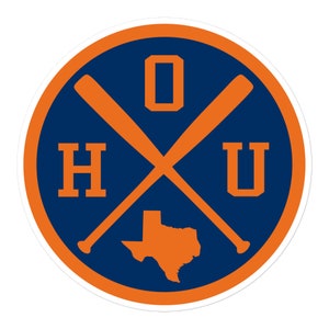 May include: A circular sticker with an orange outline and a blue center. The center features two crossed baseball bats, the letters "H" and "U" on either side of the bats, and the letter "O" above the bats. The outline of the state of Texas is also visible in the center of the sticker.