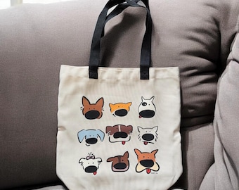 Bolsa de mano con caras de perrito