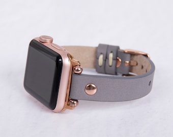Graues schmales Echtlederarmband mit roségoldenen Details für alle Apple Watch Serie, Fitbit Versa, handgefertigtes Lederarmband für Damen.