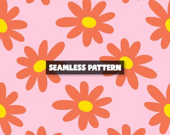 May include: Seamless pattern featuring orange flowers with yellow centers on a light pink background. The flowers are evenly spaced and repeated across the surface. The text "SEAMLESS PATTERN" is displayed in a black rectangle.