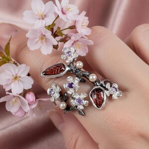 Handmade blossom tourmaline ring representing beauty, growth, and timeless feminine grace.