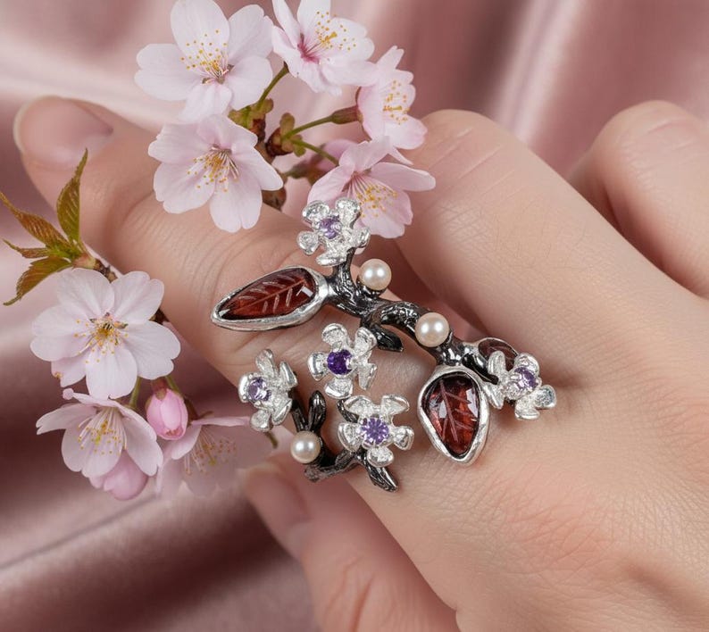 Handmade blossom tourmaline ring representing beauty, growth, and timeless feminine grace.