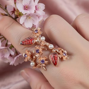 Handmade tourmaline ring with branch band and delicate flower motif for women.