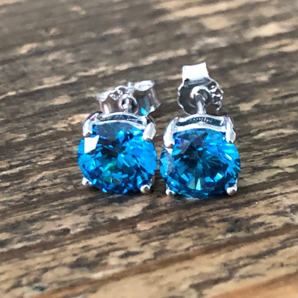 Natural 4mm Blue Topaz Stud Earrings