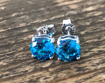 Natural 4mm Blue Topaz Stud Earrings