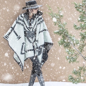 Los Ojos Riding Poncho – Hooded, Reversible | Black & Ivory | Western, Mountainwear, Travel Gift