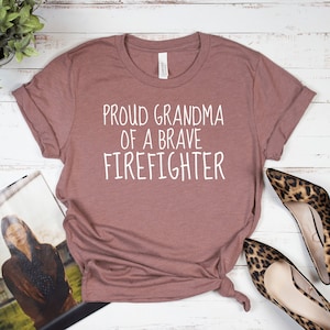 Firefighter Grandmother Shirt, Proud Grandma Of A Brave Firefighter, Grandparents Day Gift For Mimi, Firefighting Fire Fighter Unisex Tee