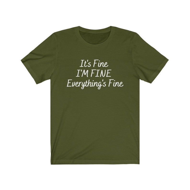 May include: A green t-shirt with the text "It's Fine I'M FINE Everything's Fine" printed in white.