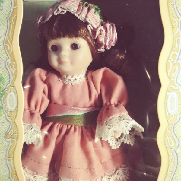 Marie Osmond Greeting Card Doll- 1997 porcelain- limited edition