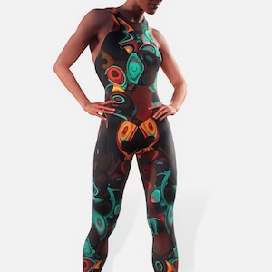 May include: A full-body jumpsuit with a vibrant, abstract pattern in shades of black, brown, teal, orange, and yellow. The sleeveless garment features a high neckline and a form-fitting design, showcasing a unique and eye-catching aesthetic.