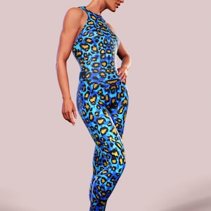 May include: A blue and yellow leopard print jumpsuit with a high neckline and sleeveless design.