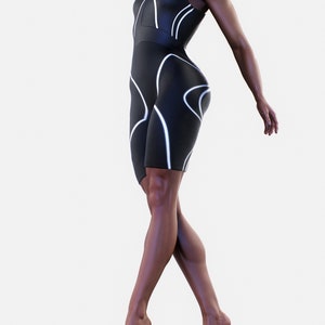 May include: A black one-piece athletic suit with white geometric lines. The suit has a high neckline and sleeveless design.