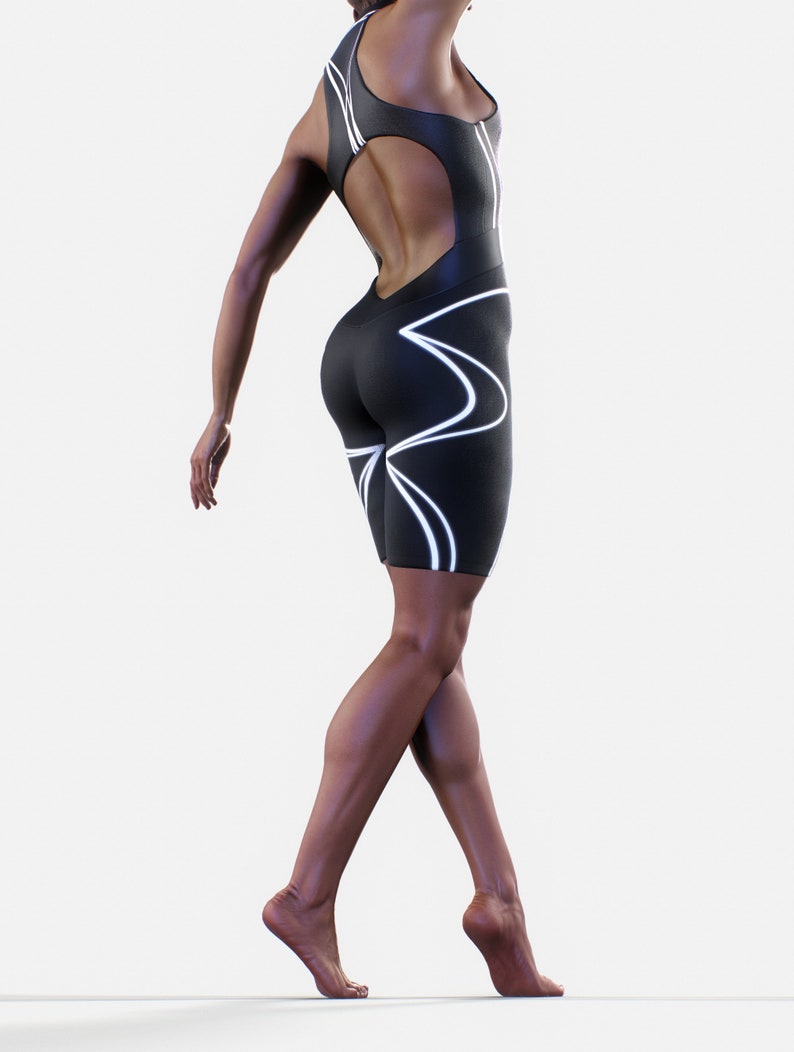May include: A black one-piece athletic suit with white geometric lines. The suit has a cutout back and a high neckline.