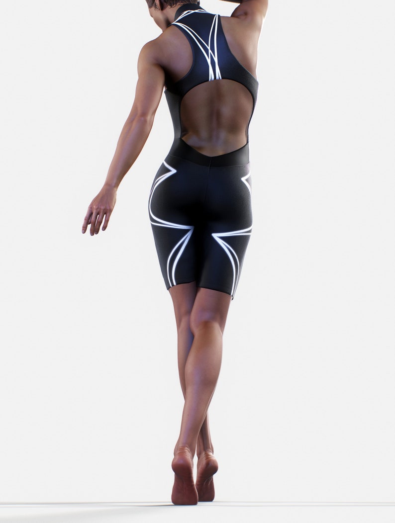 May include: A black one-piece athletic suit with white geometric designs. The suit has a high neckline and a cutout back.