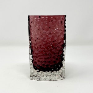 A textured glass Nailhead vase in Aubergine designed by Geoffrey Baxter for Whitefriars Glass