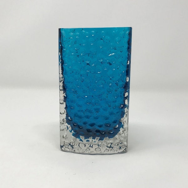 A textured glass bow fronted Nailhead vase in Kingfisher blue designed by Geoffrey Baxter for Whitefriars