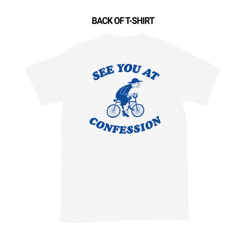May include: White t-shirt with a blue graphic of a person riding a bicycle, and the text "SEE YOU AT CONFESSION" in blue. The back of the shirt is visible.