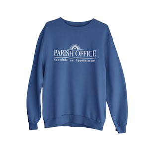May include: A blue sweatshirt with the text "PARISH OFFICE" and "Schedule an Appointment" in white. The logo includes a sun with a cross above it.