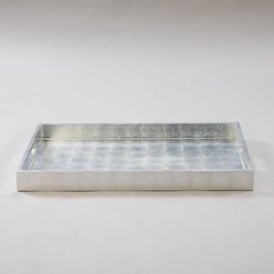 May include: A silver rectangular tray with a raised edge and a slightly textured surface.