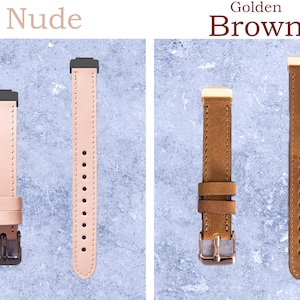 May include: Two watch bands are displayed. One is a light nude color with a black buckle and connector. The other is golden brown with a rose gold buckle and connector. Both bands are made of leather and have stitching along the edges.