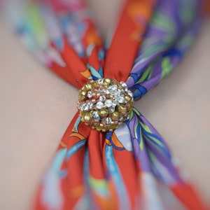 Gold ruffle flower, beaded with Swarovski crystals scarf ring