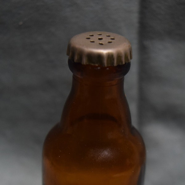 Vintage Salt/Pepper Shaker Beer Bottle - Dark Amber Glass - Metal Top - Bottom Marked Muth Buffalo Pat Pend