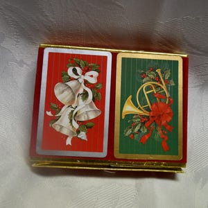 Juego vintage de dos barajas de naipes "Campanas/Cuerno" del Congreso en su estuche original de cartón rojo flocado (cada baraja en su propia caja).