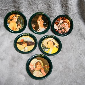 Vintage Near Mint Condition-1984 Coca Cola Calendar Girls Set of 6 Coasters/Advertised as Ornaments - I Am Listing as Coasters - No Box