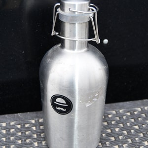 Vintage Ross and Rye 64 Ounce Stainless Steel Flip Top Growler / Drink Mixer / Server - Black Circle With Silver Derby And Mustache Inside