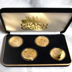 希少.金色.ゴルゴ13の置物.高さ30センチ位..24KGP金杯１点オマケ付き Vintage 1998-1999 Grand Casino Set of 4 Minnesota Landmarks
