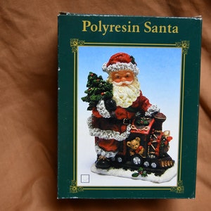 Polyresin Santa Ornament With Sack of Gifts