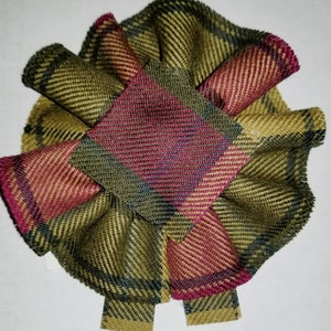 MacMillan Old Weathered Tartan as Scottish Blossom. Wool Tartan Rosette to display pin, broach or family clan badge.