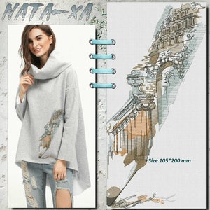 May include: Gray sweatshirt with a graphic print of a building with columns and arches. The print is in shades of brown, beige, and gray. The sweatshirt has a cowl neck and a long, flowing hem. Size 10.5 inches by 8 inches.