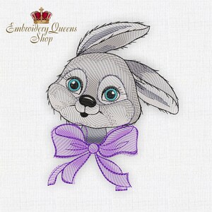 May include: Embroidered design of a gray bunny with blue eyes wearing a purple bow. The bunny is looking to the right. The design is on a white background.