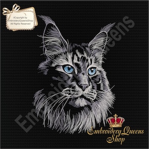 May include: A black and white line drawing of a Maine Coon cat with blue eyes. The cat is looking directly at the viewer. The image is on a black background with the text "Embroidery Queens Shop" in white letters below the cat.