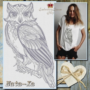 May include: A gray embroidered design of an owl with intricate details. The design is on a white t-shirt and the text "Embroidery Queens Shop" is in the background. The text "Nata-Xa" is at the bottom of the image.