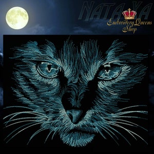 May include: A close-up of a blue and white embroidered cat face against a dark background. The cat's eyes are large and piercing, and its whiskers are long and thin.