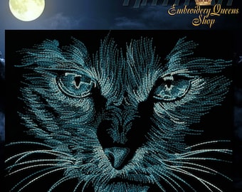 May include: A close-up of a blue and white embroidered cat face against a dark background. The cat's eyes are large and piercing, and its whiskers are long and thin.