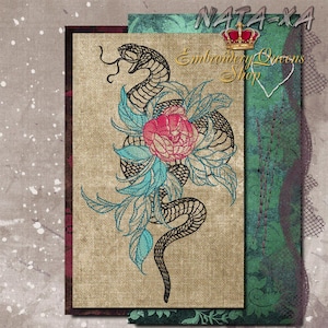 May include: Embroidered design of a black snake wrapped around a pink flower with blue leaves. The design is on a beige fabric background. The text "Embroidery Queens Shop" is visible in the upper right corner.