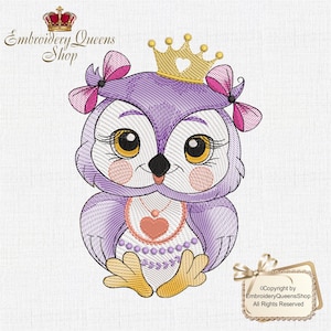 May include: Purple embroidered owl wearing a gold crown with a heart on top. The owl has pink bows on its head and a pink heart necklace. The owl is sitting with its feet tucked under its body.