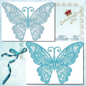Könnte beinhalten: Zwei blaue Stickmuster eines detaillierten Schmetterlings mit Spiralen und Punkten. Die Muster sind auf weißem Hintergrund. Der Text "Embroidery Queens Shop" und "Nata-Ha" befindet sich in der oberen rechten Ecke des Bildes.
