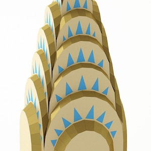 May include: A stylised architectural model of a skyscraper spire featuring a series of tiered, semi-circular arches in a light tan colour. Each arch is decorated with a repeating pattern of small, bright blue triangular cutouts along the edge.