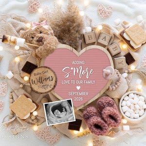May include: A baby announcement design with a pink heart-shaped sign that reads "Adding S'More Love to Our Family" and "September 2026." The image includes a teddy bear, baby booties, ultrasound photo, wooden blocks, and s'mores.