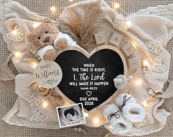 May include: A heartwarming baby announcement featuring a teddy bear, wooden blocks spelling "BABY", and a heart-shaped chalkboard with text. Includes a sonogram image, baby booties, and a due date of April 2026. The announcement is set on a soft, neutral-toned blanket.